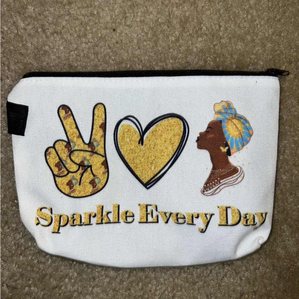 White and Gold Graphic Pouch